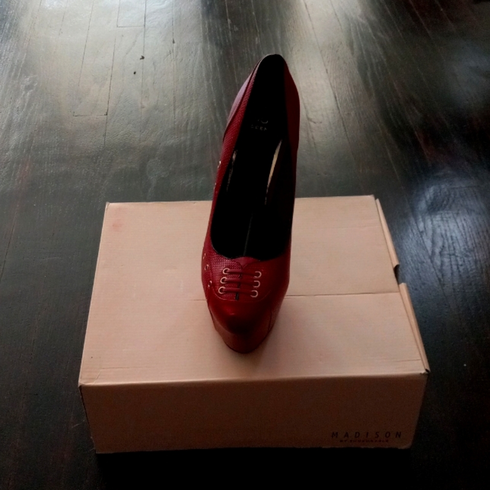 Red leather with lace up in the front